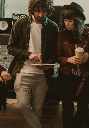 music band having conversation at sound recording studio music band having conversation at sound recording studio